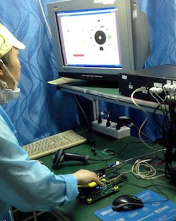 Custom-built automated test equipment in use on production line